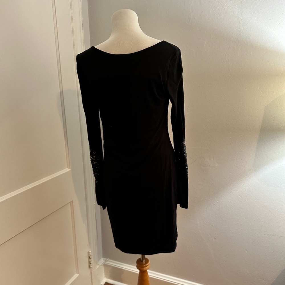 Fantastic Fawn black dress with sequin elbow patches